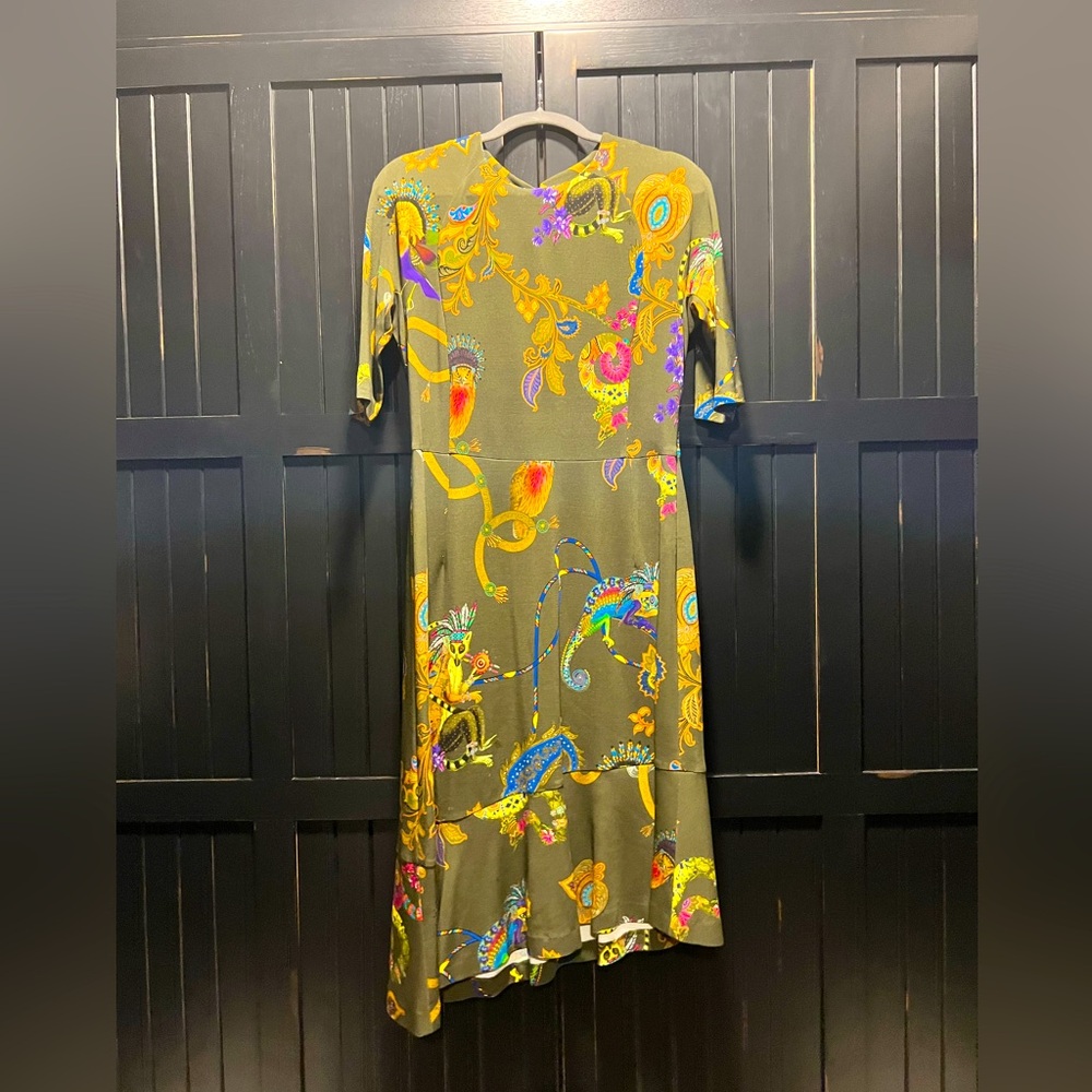 Etro mid length fitted dress fabric with exotic print. Worn once